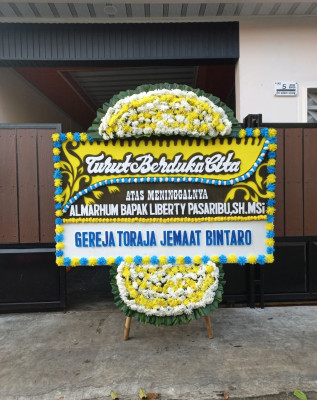Papan Bunga Duka di Songgon